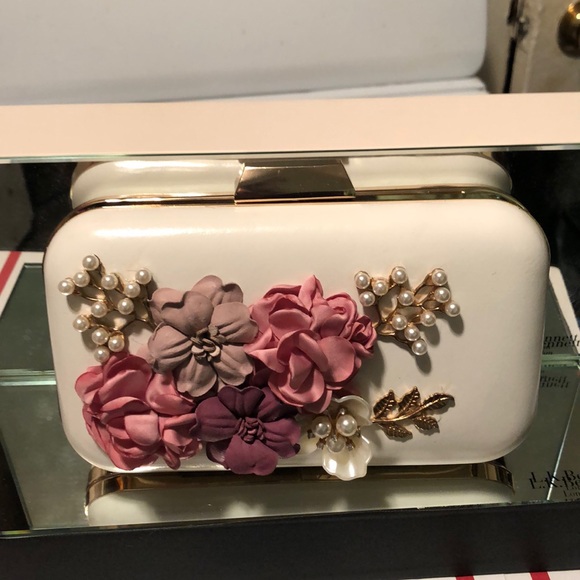 Handbags - Pre loved white clutch w/satin flowers & stones on front